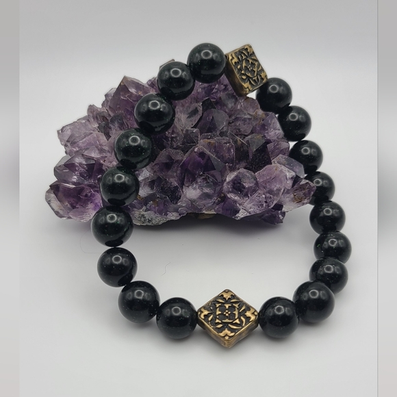 Jewelry - 10mm green Goldstone bracelet with Tibetan style charms.